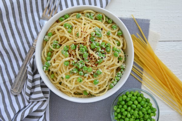 overhead shot of bowl of pasta and peas
