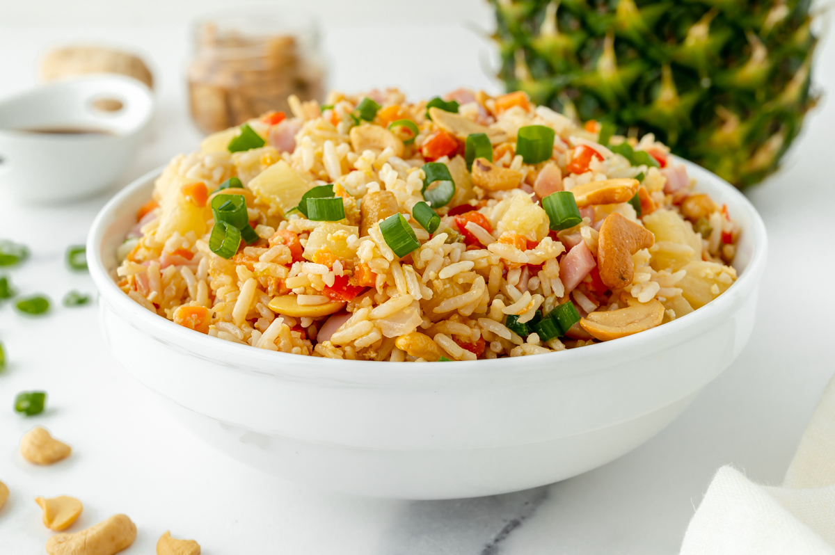 angled shot of bowl of pineapple fried rice