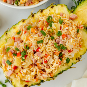 overhead shot of fried rice in a pineapple