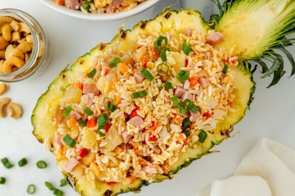 overhead shot of fried rice in a pineapple