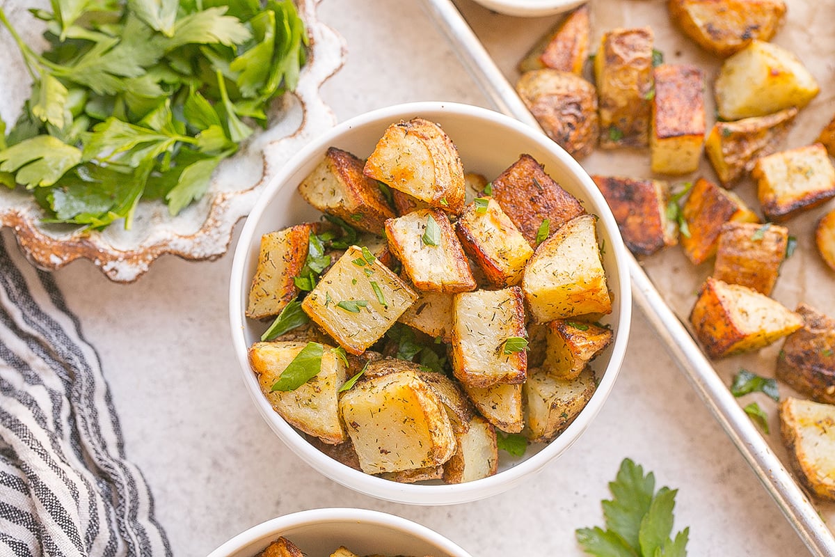 overhead shot of small white bowl of ranch potatoes