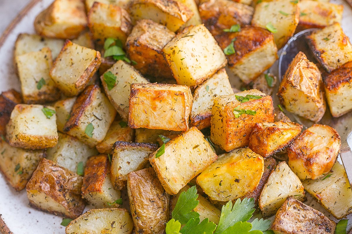 close up shot of plate of roasted ranch potatoes