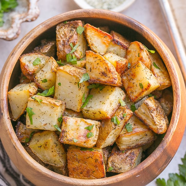 overhead shot of roasted potatoes in bowl