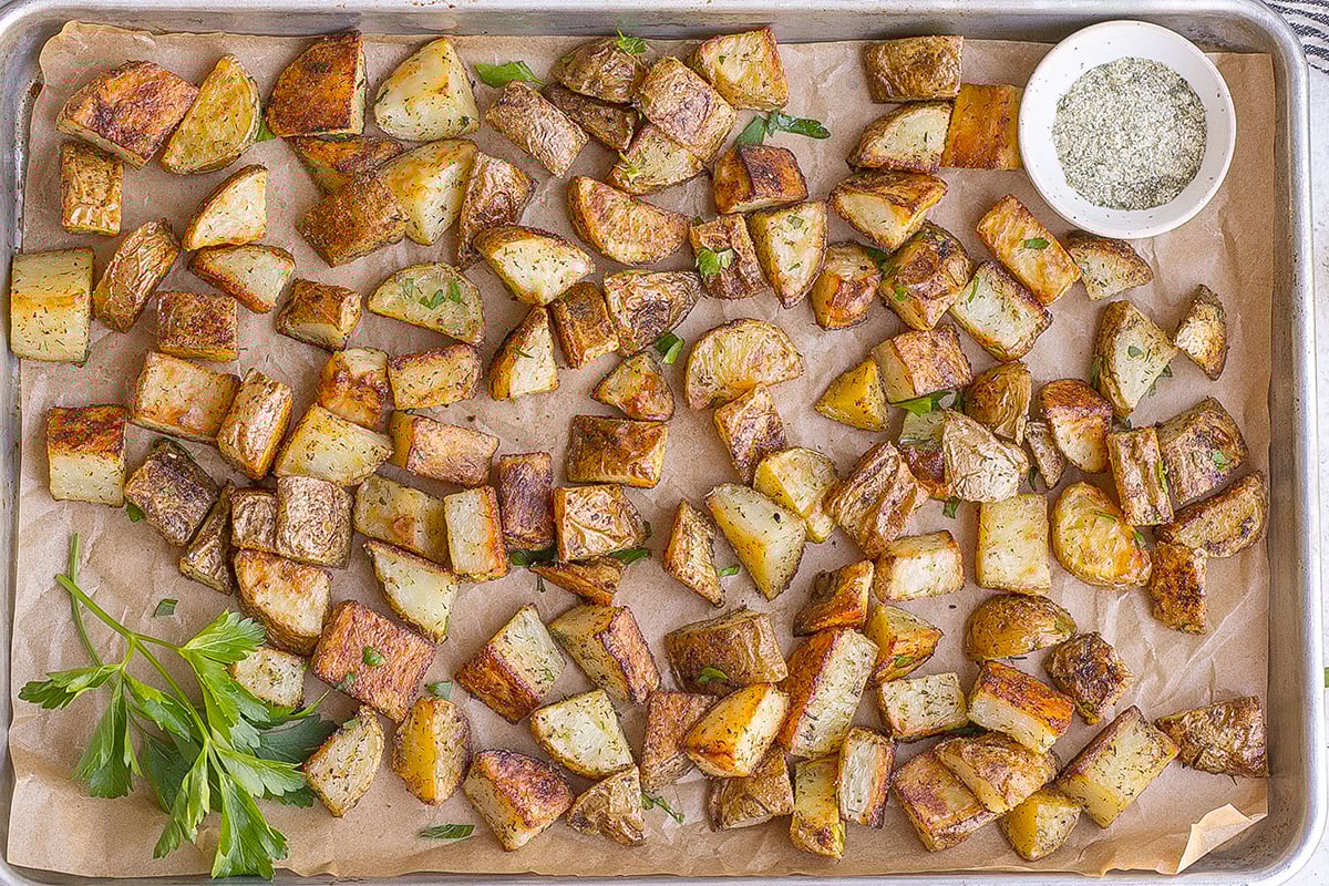 overhead shot of ranch potatoes on sheet pan