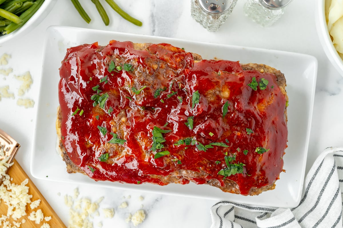 overhead shot of stuffed meatloaf on platter