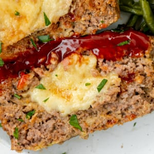 close up overhead shot of slice of stuffed meatloaf