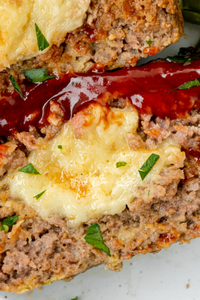 close up overhead shot of slice of stuffed meatloaf