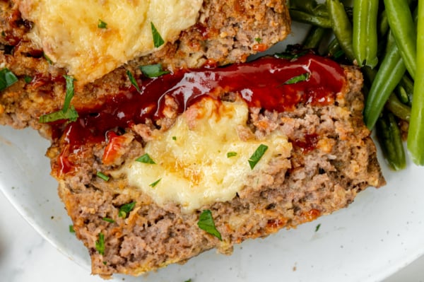 close up overhead shot of slice of stuffed meatloaf