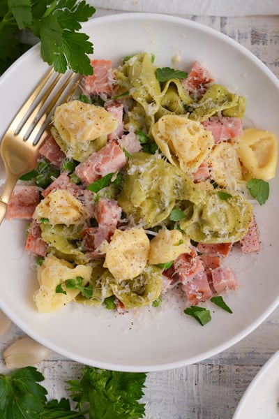 overhead shot of bowl of tortellini with ham