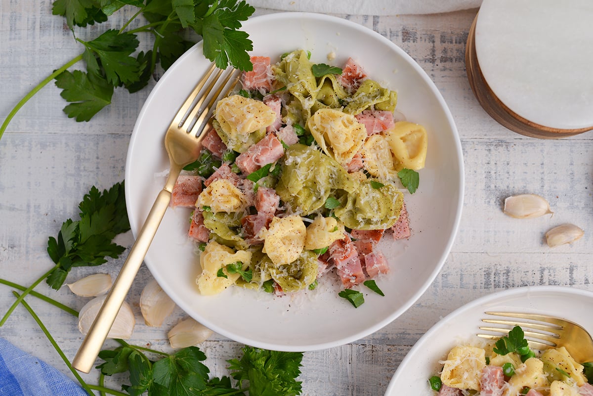 overhead shot of bowl of tortellini with ham