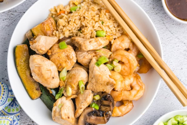 overhead of shrimp and chicken hibachi with fried rice