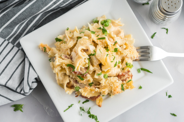 white plate with chicken noodle casserole