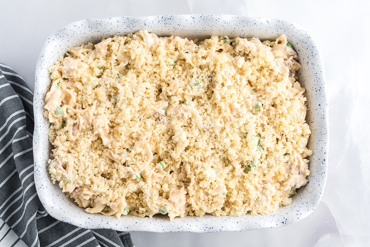 uncooked chicken noodle casserole in a baking dish