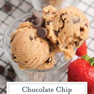 overhead close up of two scoops of edible cookie dough with a strawberry next to it