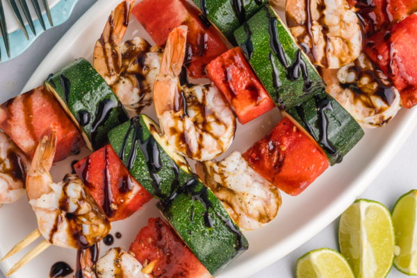 close up overhead shot of platter of grilled watermelon shrimp kabobs