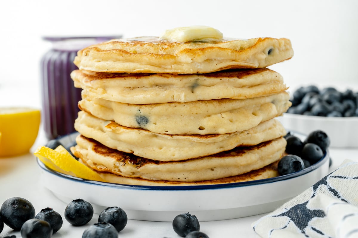 straight on shot of stack of lemon ricotta pancakes