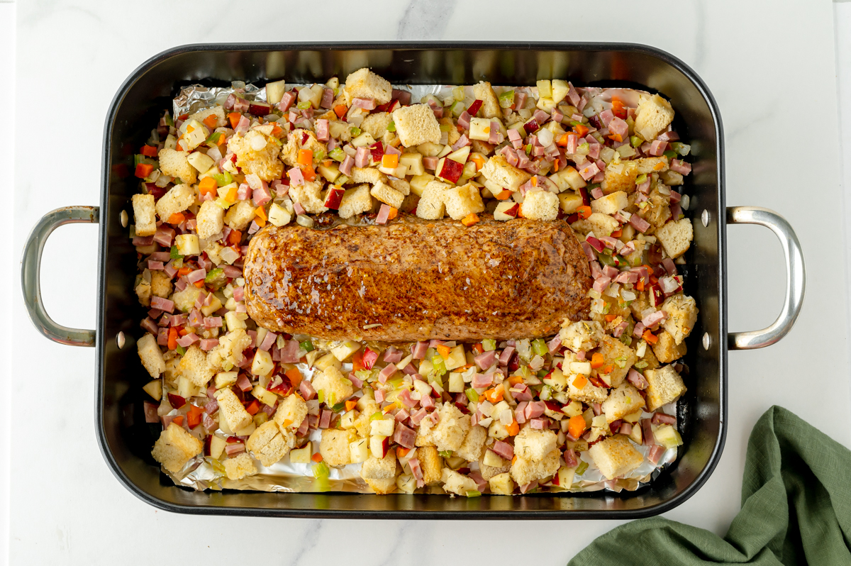 pork tenderloin in baking dish with stuffing