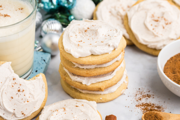 close up angled shot of stack of eggnog cookies