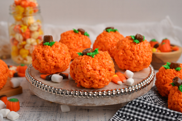 rice krispie pumpkins on a tray