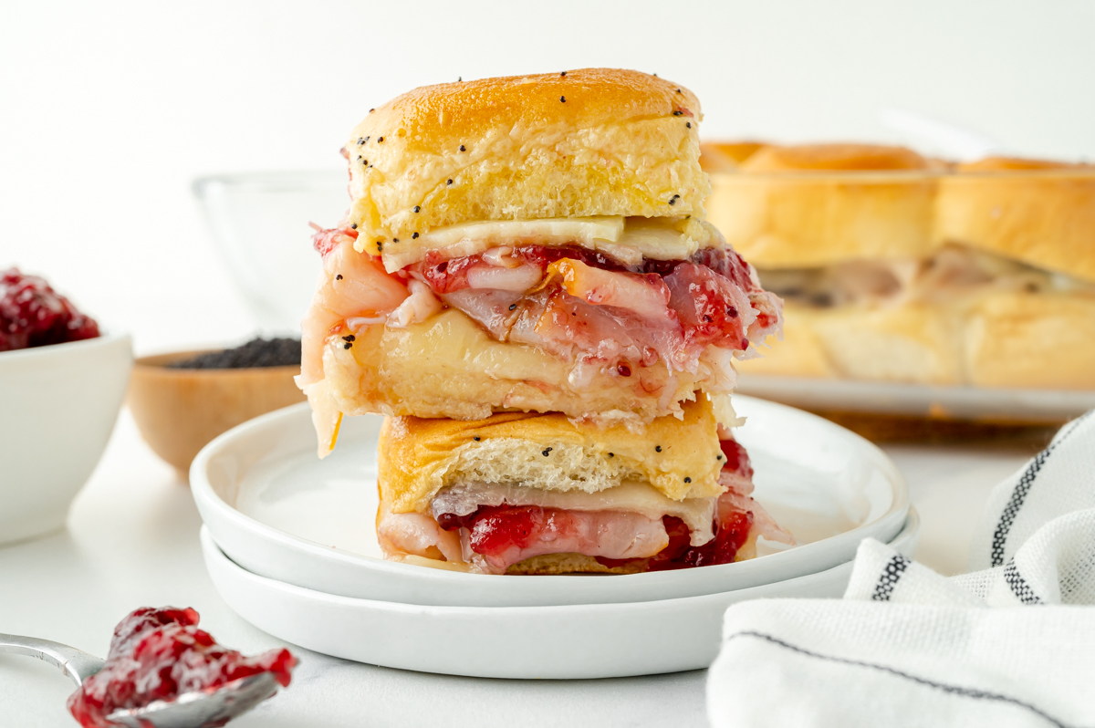 stack of two cranberry turkey sliders on a plate