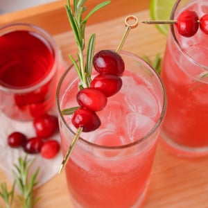 close up angled shot of cranberry whiskey sour