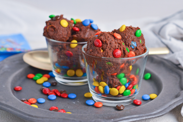 two glass bowls of chocolate edible cookie dough