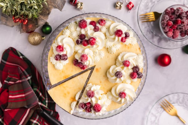 overhead shot of slice cut out of eggnog cheesecake