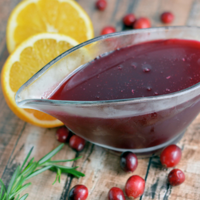 angled shot of bowl of cranberry syrup