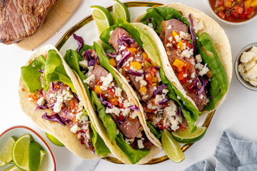 overhead shot of platter of steak tacos