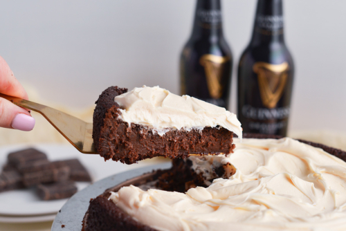 slice taken out of flourless guinness cake