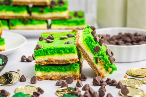 close up of stack of cheesecake bars