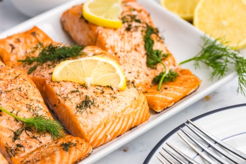angled shot of lemon dill salmon on serving tray