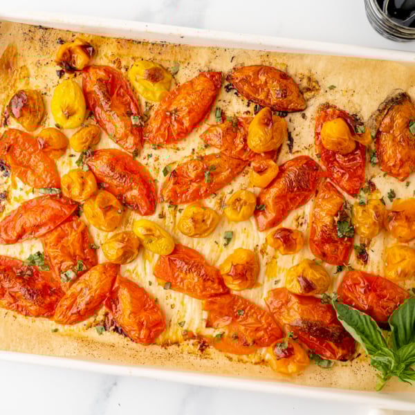 overhead shot of sheet pan of roasted tomatoes