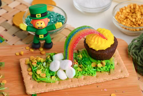 close up angled shot of pot of gold snack with leprechaun