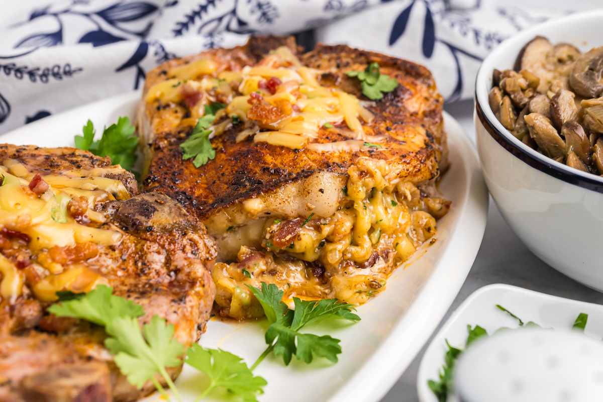 close up angled shot of baked stuffed pork chops