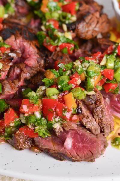 angled shot of bavette steak on plate
