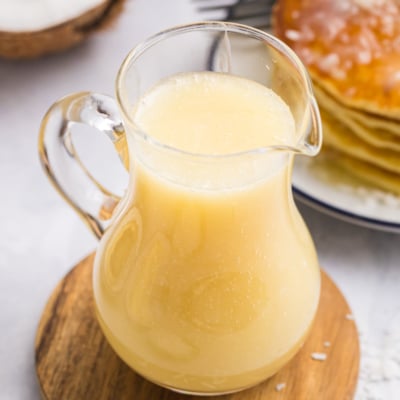angled shot of coconut syrup in jar