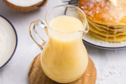 angled shot of coconut syrup in jar