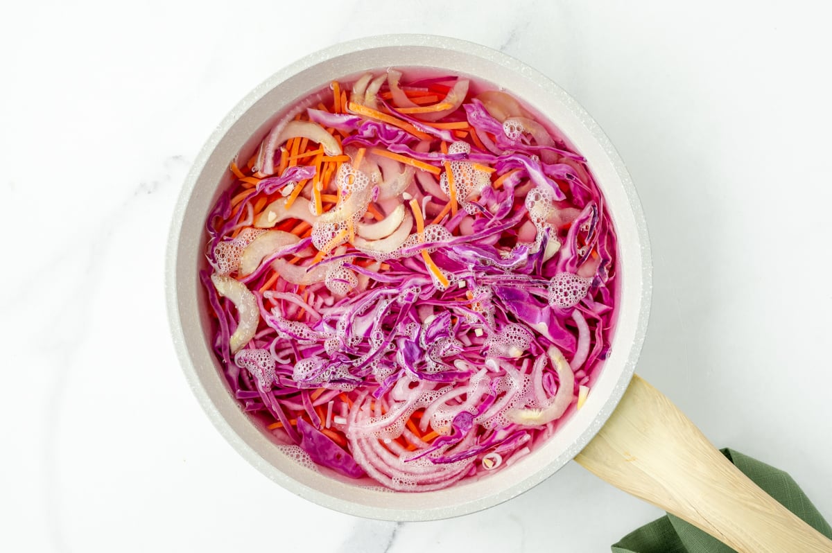 overhead shot of kimchi ingredients in pot