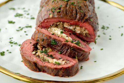 close up of sliced stuffed flank steak