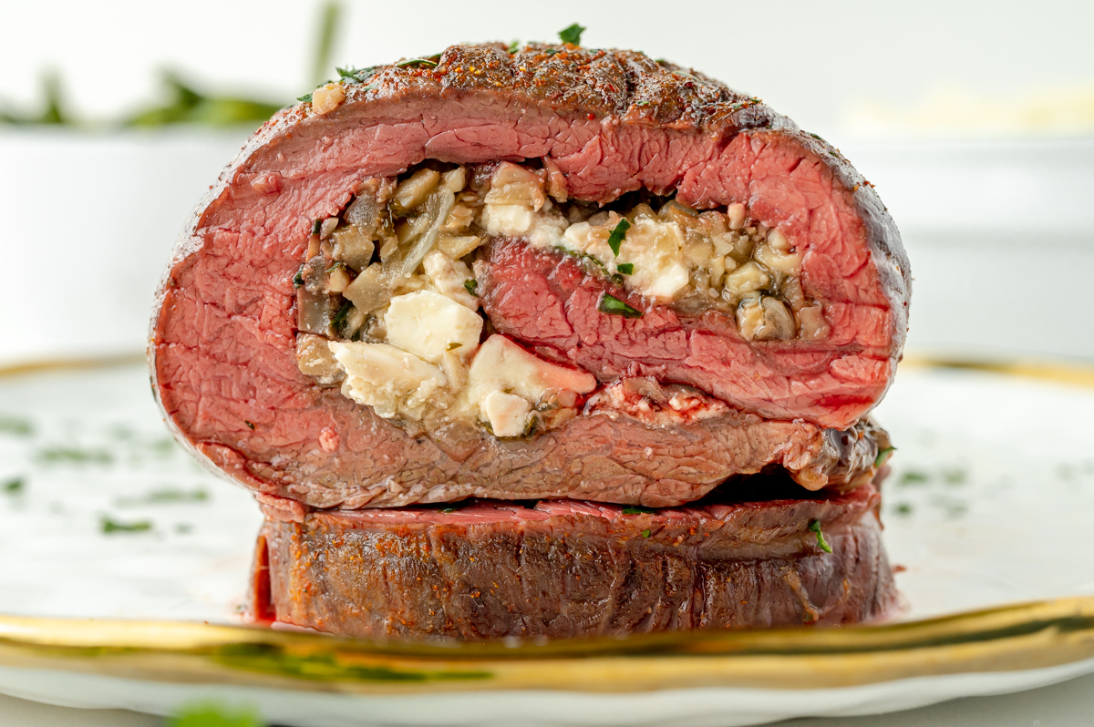 close up straight on shot of sliced stuffed flank steak