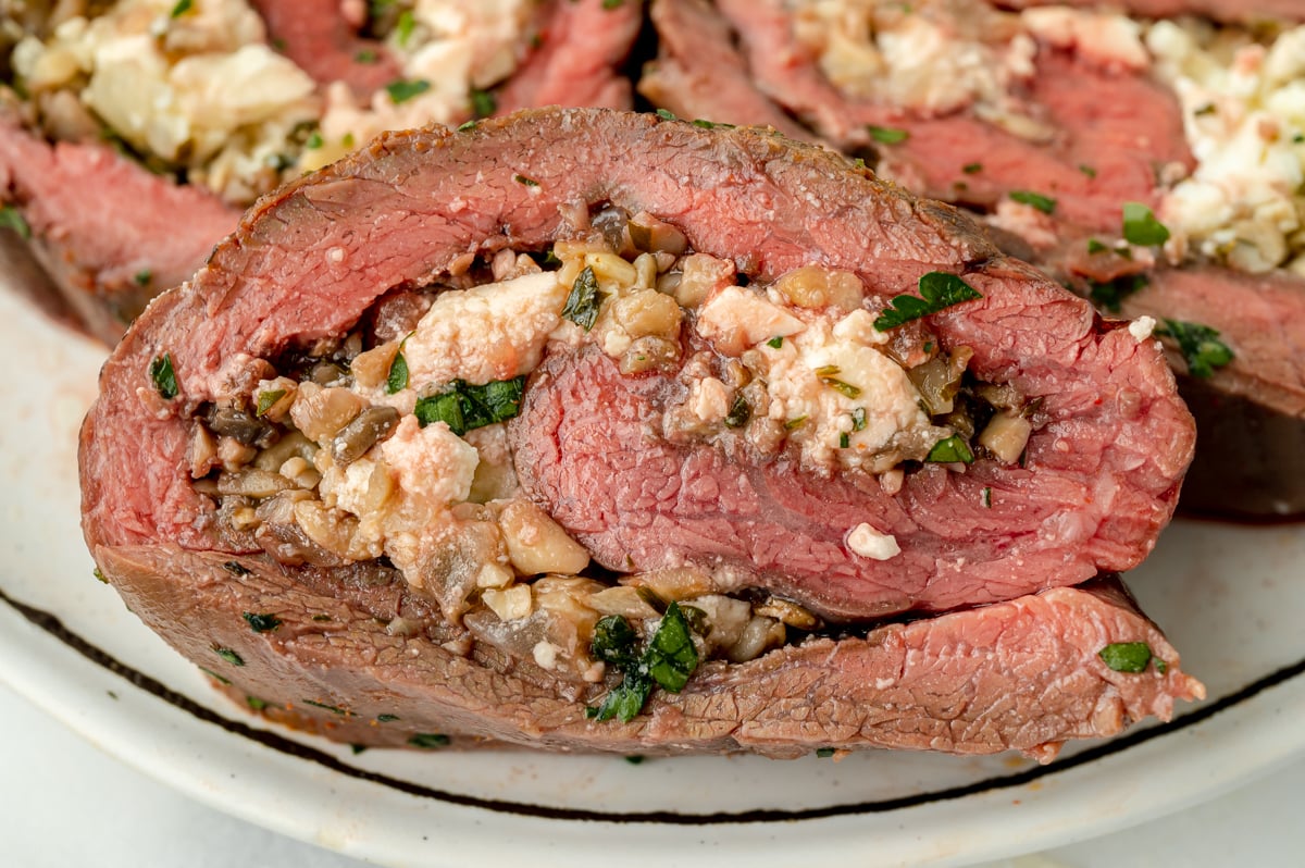 close up of slice of stuffed flank steak