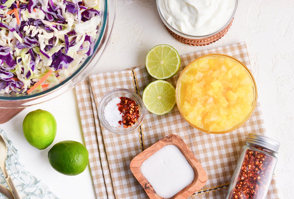 overhead shot of yogurt pineapple coleslaw ingredients