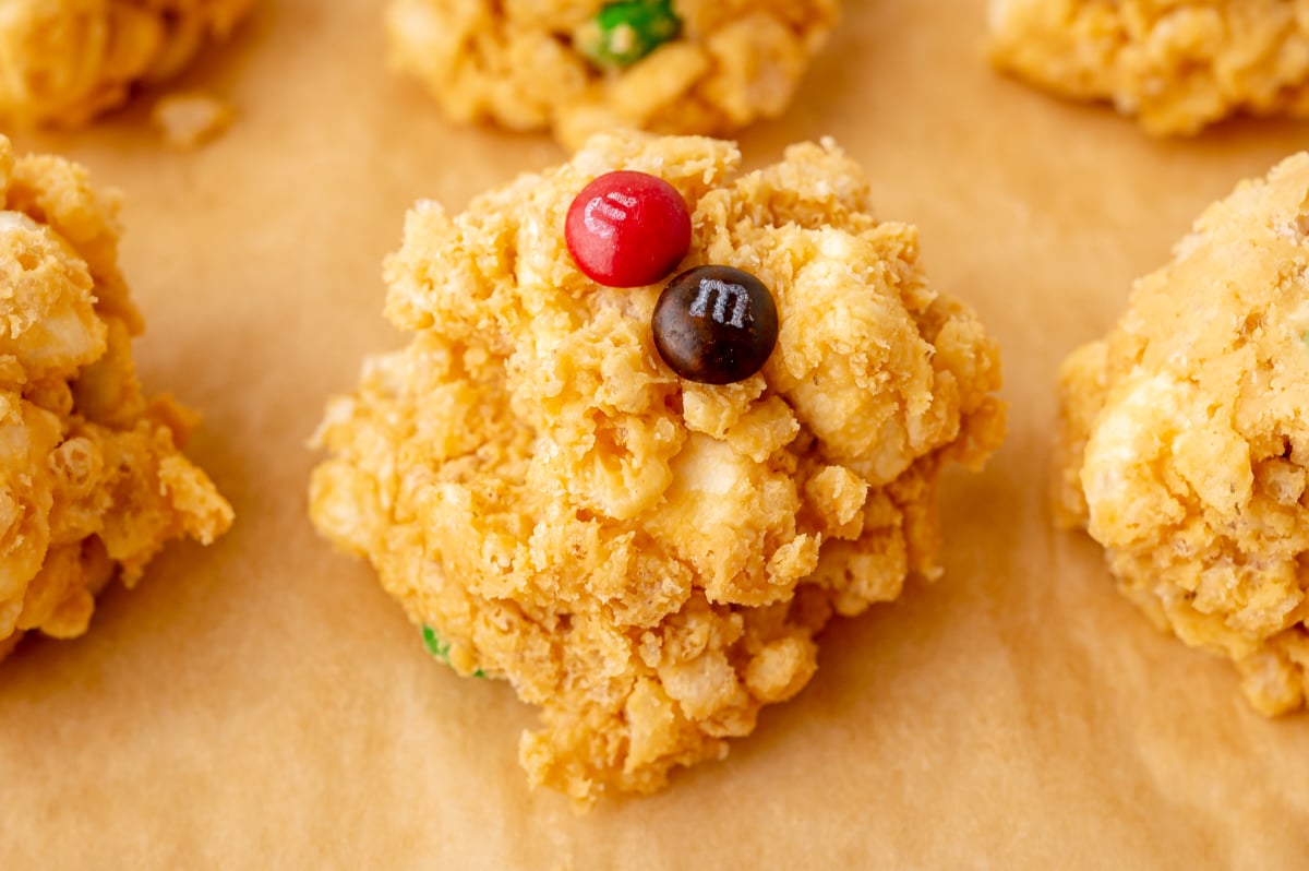 close up angled shot of avalanche cookie topped with two m&ms