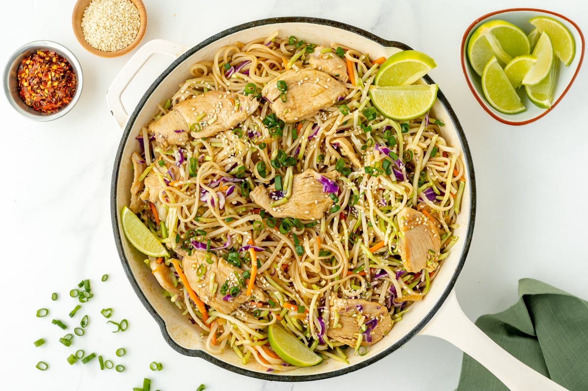 overhead shot of pan of chicken stir fry rice noodles