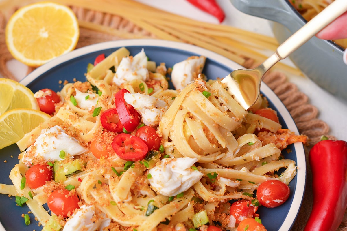 angled shot of pasta twirled onto fork