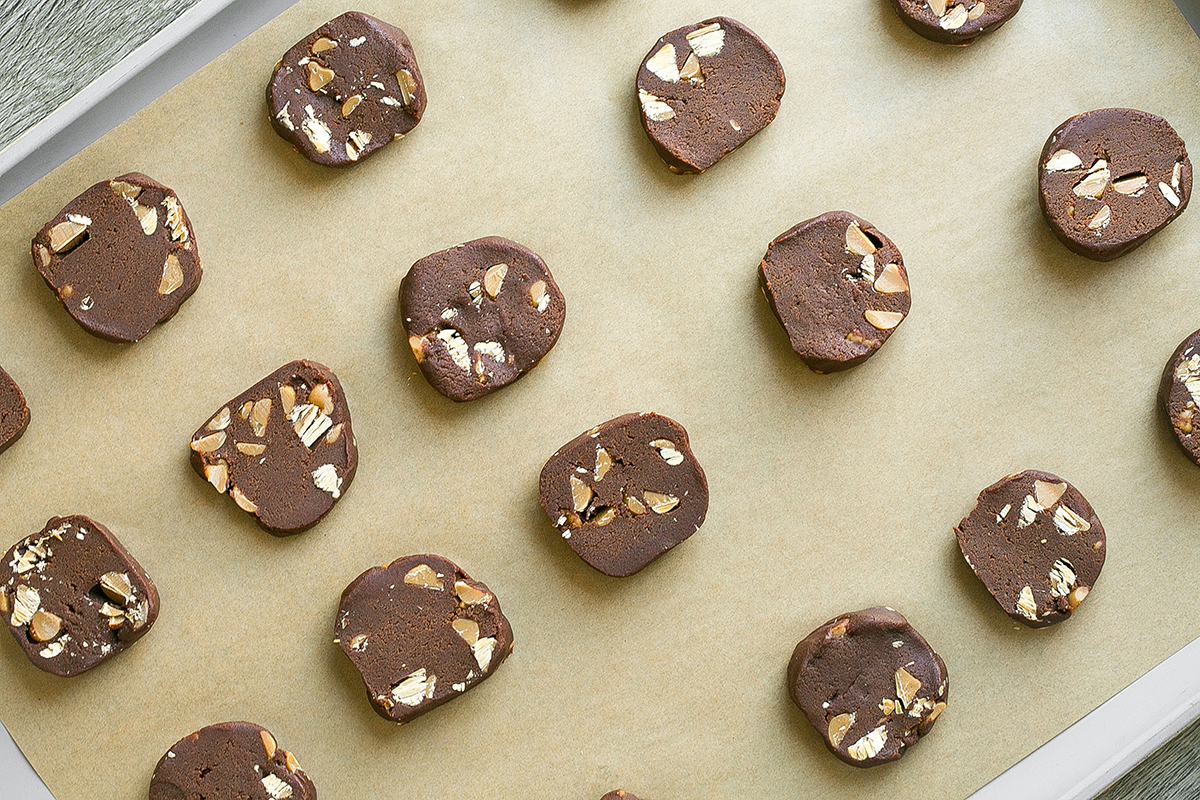overhead shot of cookie dough slices on sheet pan