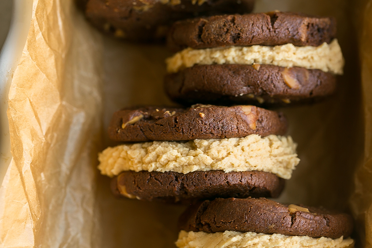 overhead shot of side view of chocolate peanut butter cookie sandwiches