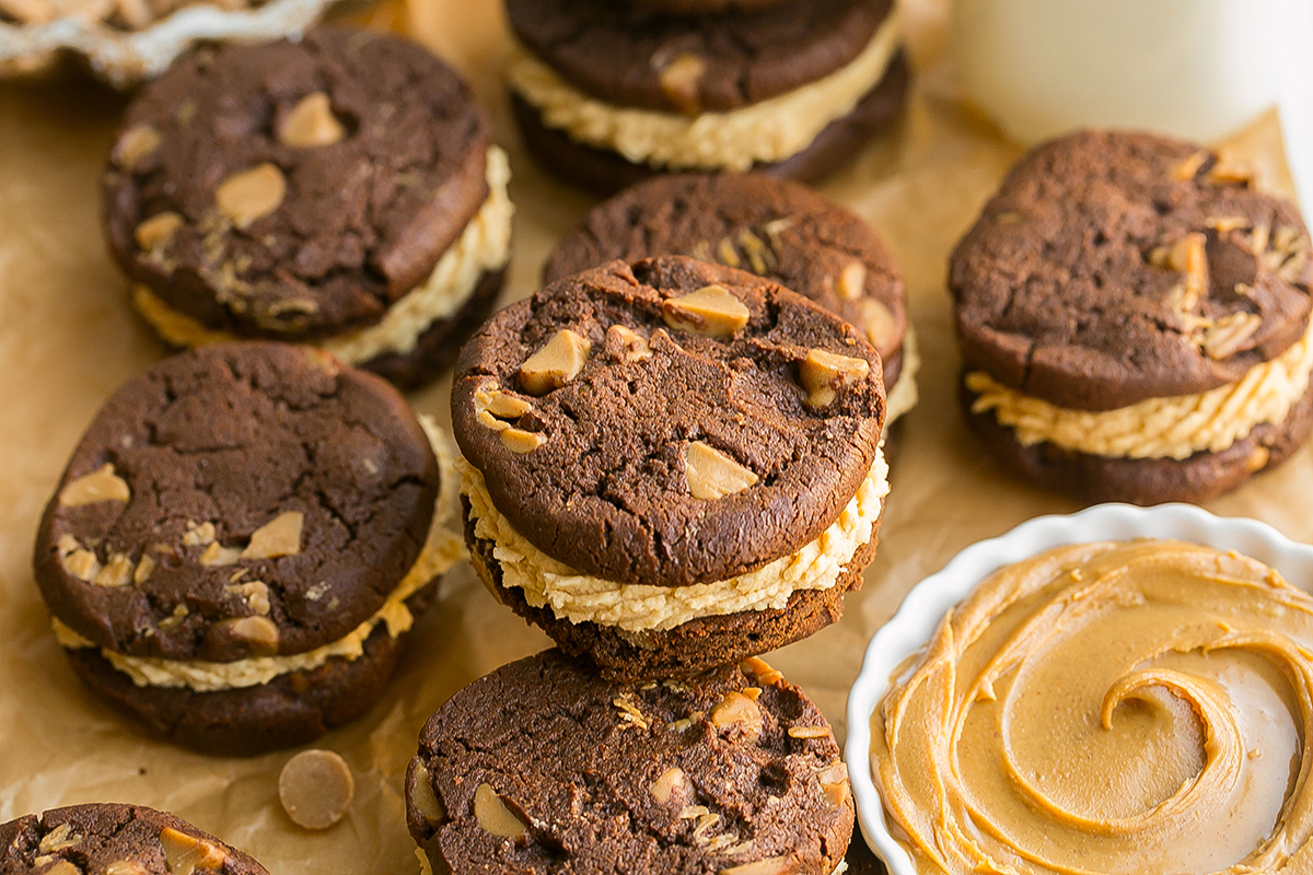 angled shot of stack of chocolate peanut butter cookie sandwiches