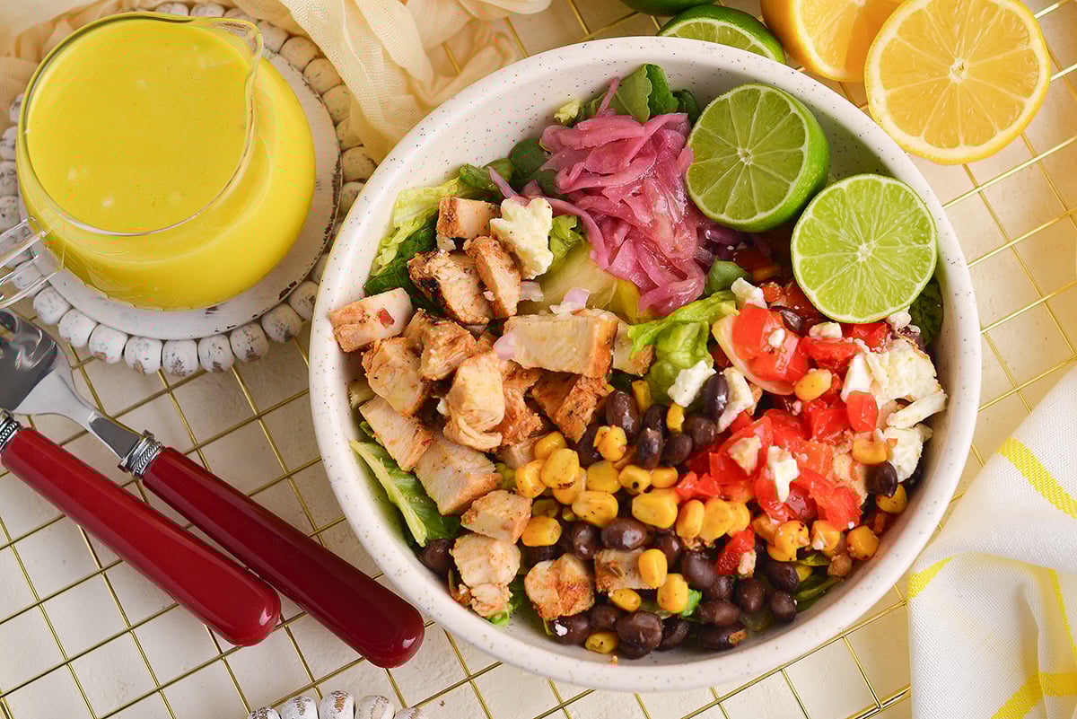 overhead shot of salad topped with citrus vinaigrette